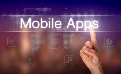 A hand selecting a Mobile Apps business concept on a clear screen with a colorful blurred background.