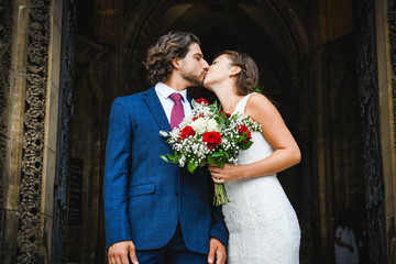 Newly wed couple on the church steps