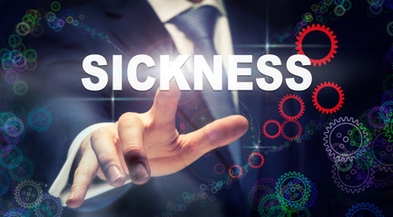 A businessman pressing a Sickness business concept on a graphical display of cogs