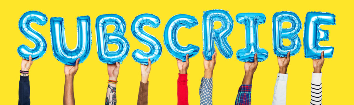 Hands holding subscribe word in balloon letters