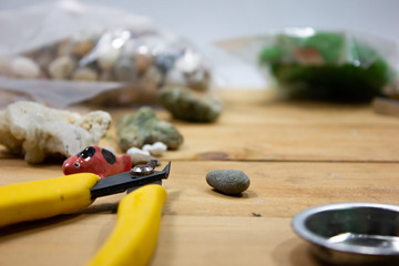 Crafting DIY decoration hobby workshop closeup tools on wooden table.