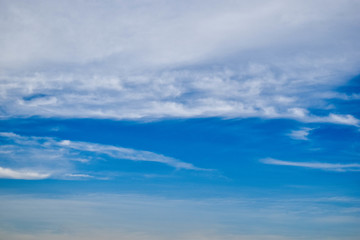 The sky is blue, the clouds are floating in a beautiful view