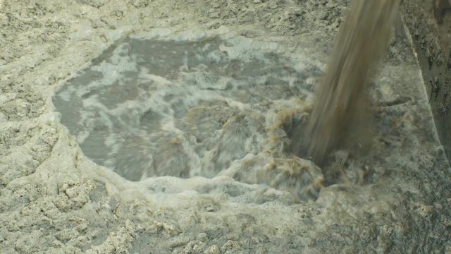 Discharge of waste water into segment clarifier biological purification of water sewage treatment plant, bubbles tank, activated sludge wastewaters process aeration and biology floc composed bacteria