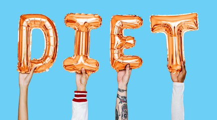 Hands showing diet balloons word