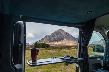 A view of Buachaille Etive Mor, Glencoe Scotland. from the door of a campervan. © Joe Dailly