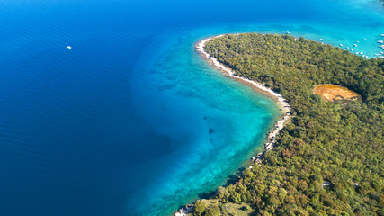 Fototapeta na wymiar Aerial view of crystal clear water off the coastline in Croatia