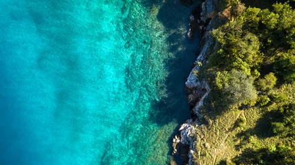 Rolgordijnen Aerial view of crystal clear water off the coastline in Croatia © Oleksii Nykonchuk