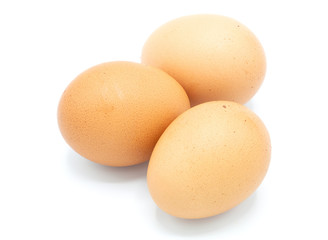 Three organic chicken egg on white background.