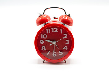 red alarm clock isolated on white background