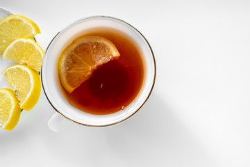 Cup of tea with lemon. Top view.