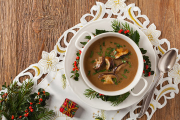 Traditional mushroom soup, made from porcini mushrooms. Christmas decoration.