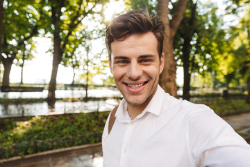 Happy young businessman wearing shirt