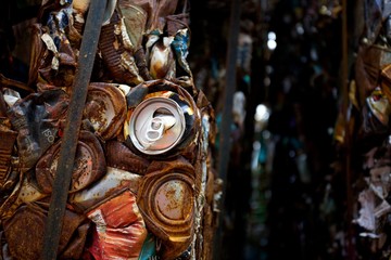 Flattened cans in a recycling centre in the UK