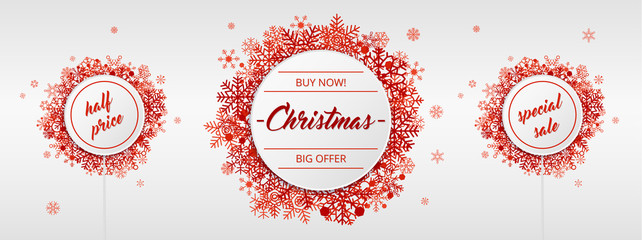 Christmas sales with red snowflakes on white background 