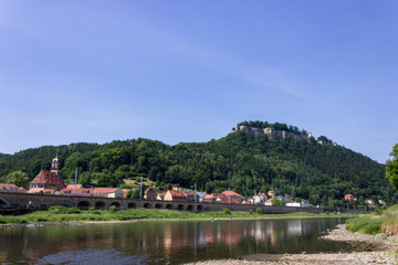 Fototapeta na wymiar Beautiful view on Königstein castle from river Elbe in Saxony, Germany