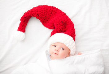 Baby boy in Christmas clothes - 233389009