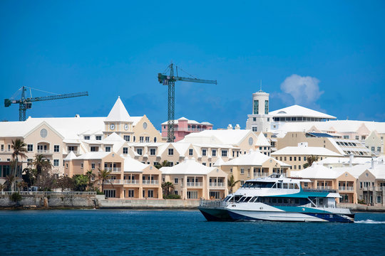 Ferry cruising along the waterfront of Hamilton, Bermuda.