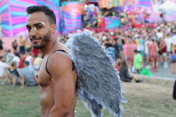 Fototapeta na wymiar Gorgeous shirtless man with wings