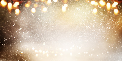 Abstract bokeh background in gold and silver
