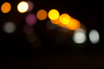 Defocused city night filtered bokeh abstract background
