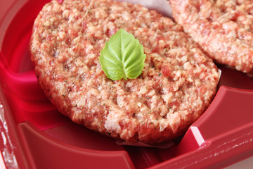 cutlet in plastic red packaging