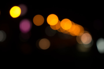 Defocused city night filtered bokeh abstract background