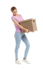 Full length portrait of woman carrying carton box on white background. Posture concept