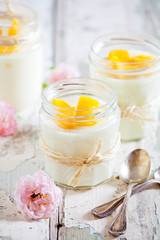 Vanilla Pudding With Mango In Small Jars
