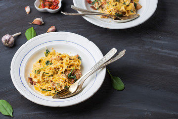 sweet potato tagliatelle with bacon, sun-dried tomatoes and spinach