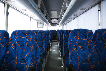 View of bus interior with empty seats
