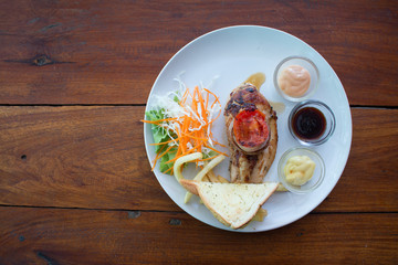Close up of steak on old wooden table background