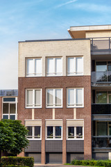 Clear sunny day at a building apartment house