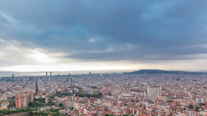 Obraz na płótnie Canvas Panorama of Barcelona timelapse, Spain, viewed from the Bunkers of Carmel