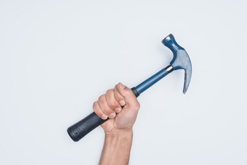 cropped shot of man holding hammer isolated on white