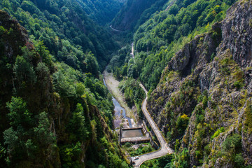 Fototapeta na wymiar Hydroelectric power plant in a valley