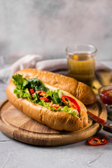 Jalapeno hotdog on wooden background