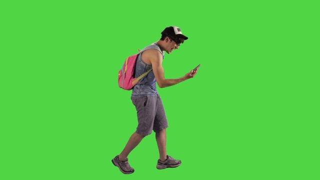 Young hipster walking