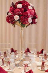 wedding table decoration with flowers and candles
