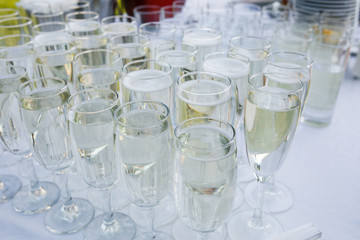 Glasses with champagne on the table on wedding