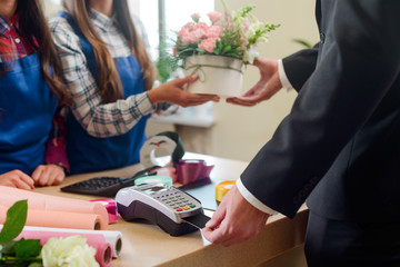 Buying bouquet for beloved woman
