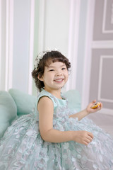 Little pretty Asian girl dressing as princess laughing portrait, healthy and happy lifestyle..