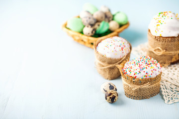 Easter orthodox sweet cakes, kulich and colorful quail eggs . Holidays Easter concept. Selective focus