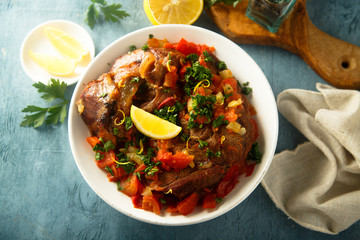 Traditional Italian Ossobuco with lemon and parsley sauce