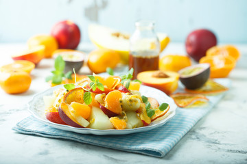 Homemade fruit salad with maple syrup dressing