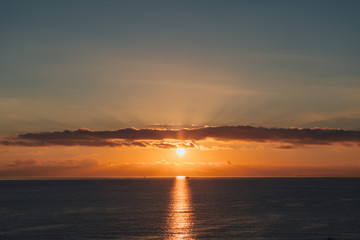 sunrise at ocean seascape with reflection