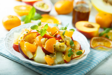 Homemade fruit salad with maple syrup dressing