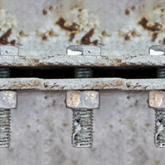 Seamless photo texture of steel panel with strong rusty screw male and female