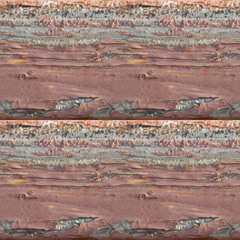 Seamless photo texture of wooden planks with red oil