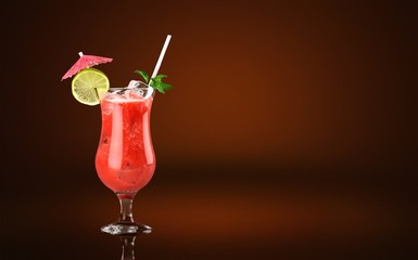 Glass of alcohol  cocktail on bar background, frozen fruit drink