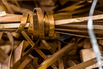 brass wire on a copper background. close-up. Close-up of recycled brass